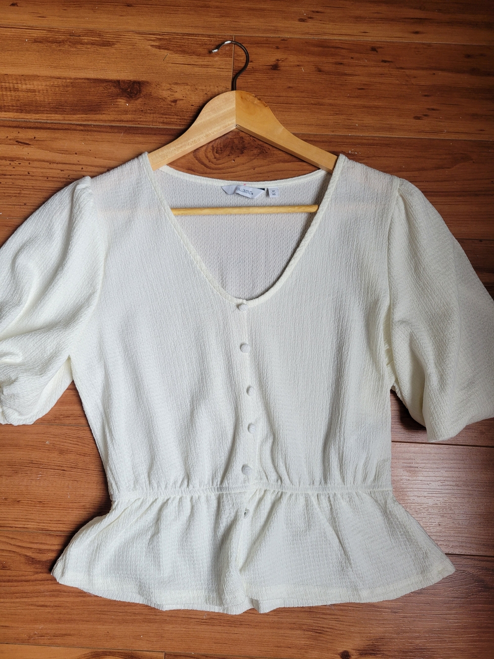 Light Cream Peplum Button-Front Blouse